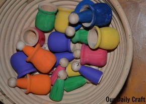 peg people in a basket